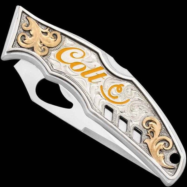 "Our Coyote Dawn custom knife is a true masterpiece of craftsmanship, designed to elevate any collection. 
This custom-made knife is crafted using a SpyderCo Byrd knife and a German Silver plate. The German Silver plate is hand-engraved & finish